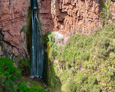 Women walking in the middle of the mountains and the Andes