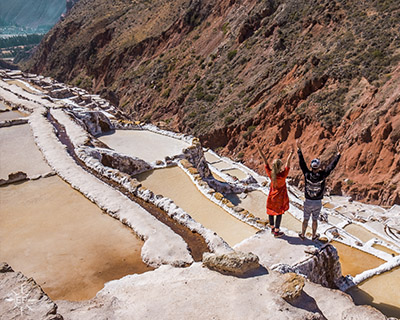 Couple in the middle of the Salar de Maras
