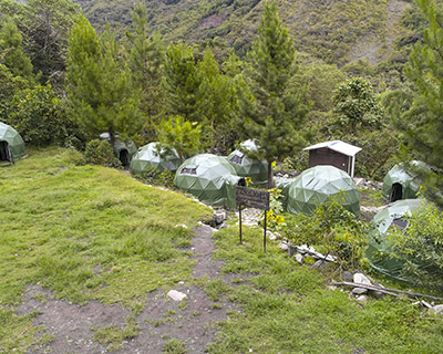 Panoramic photo of our camp in Lucmabamba where we see the Jungle Domes
