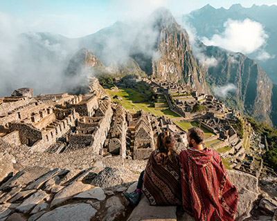 A couple reflecting on the mysticism of Machu Picchu